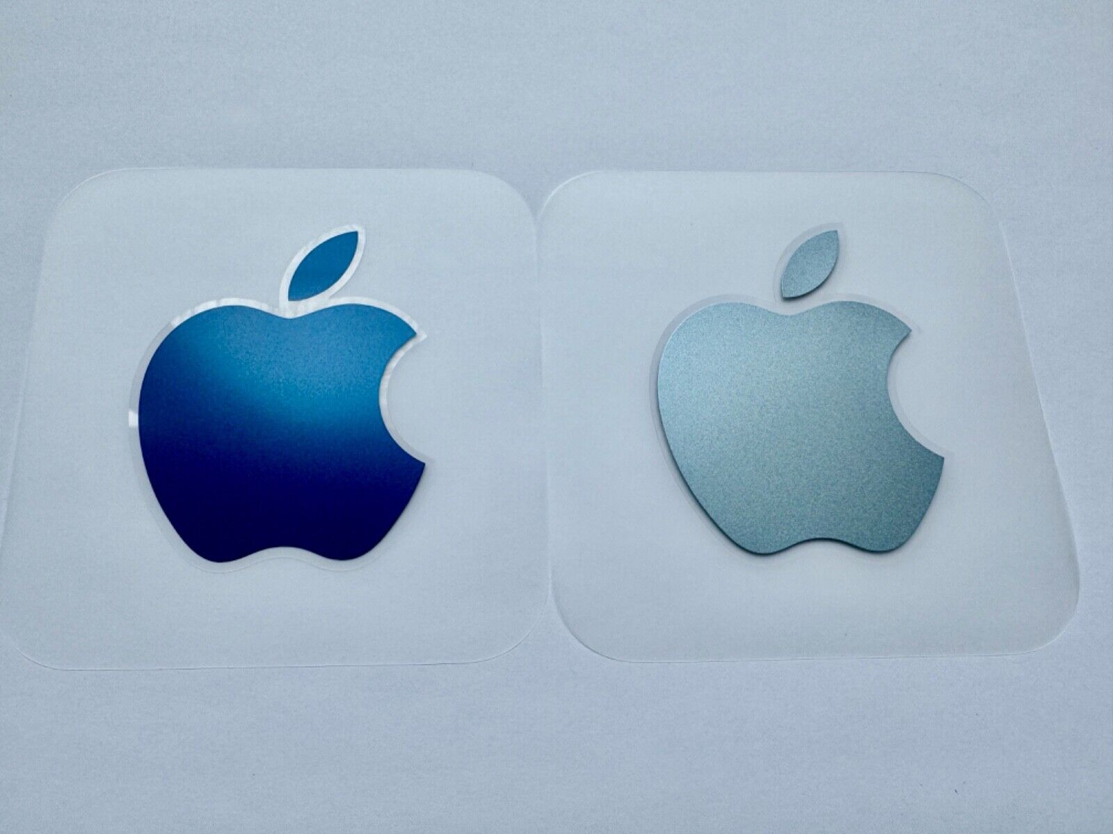 2 Genuine Apple Logo Stickers ( Dark and Light Metallic Blue)    
