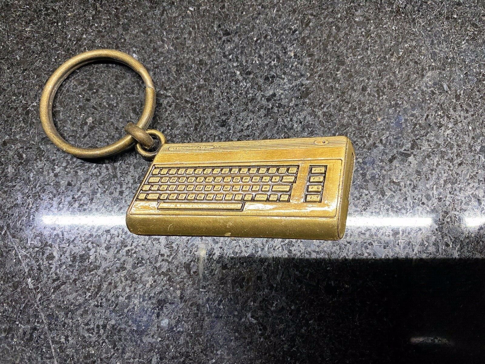 COMMODORE KEYCHAIN -THE ULTIMATE PERSONAL COMPUTER AT THE UNBELIEVABLE PRICE 