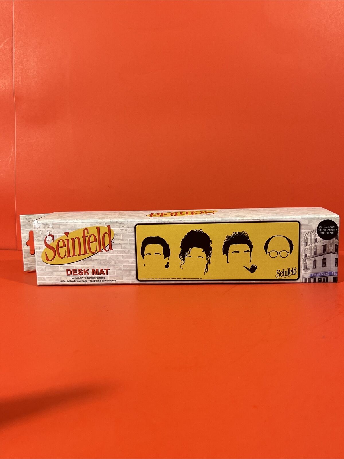 Rare Seinfeld Desk Mat. Color Yellow Large Size 11x31in. Brand New with the Box