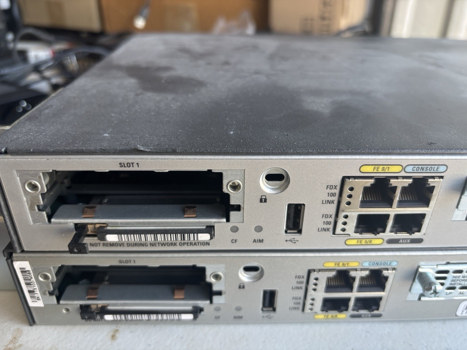 Lot of (2) Cisco 1841/K9 Integrated Router with WIC-1DSU-T1 V2 & 32MB Flash