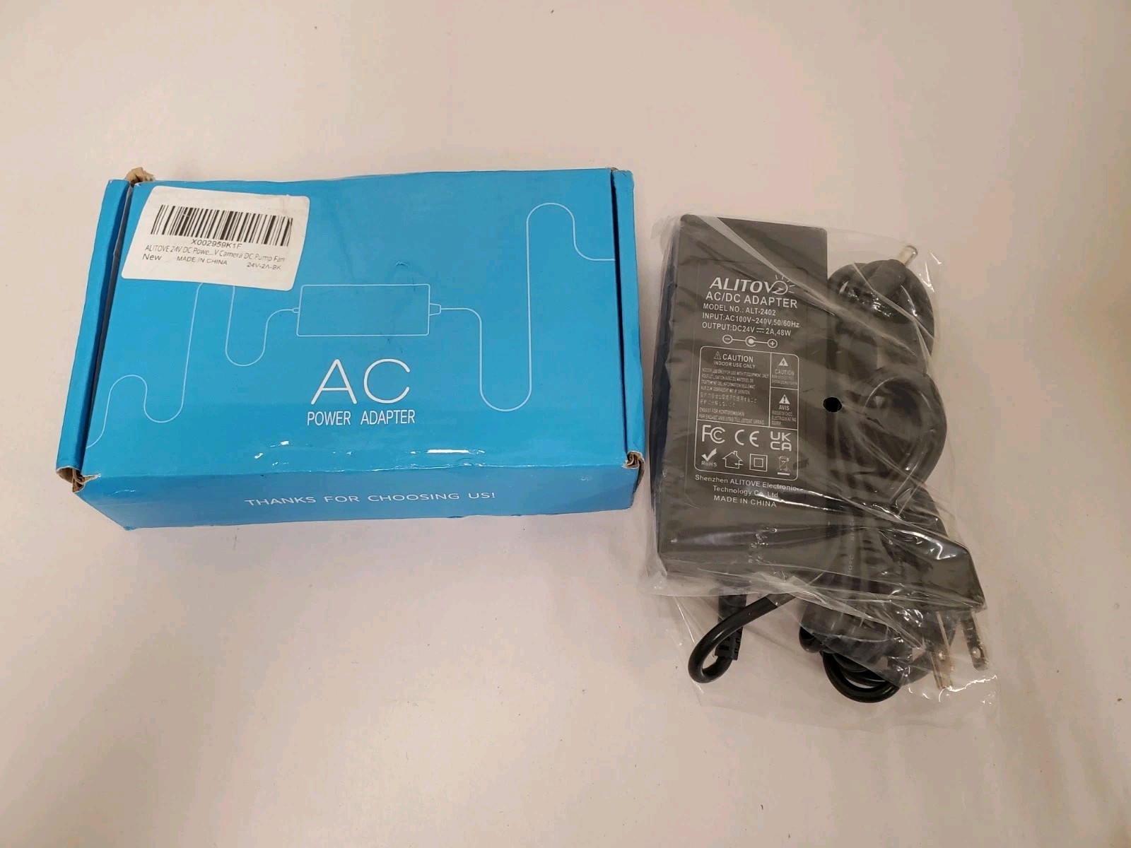 ALITOVE 24V DC Power Supply 2A 48W AC/DC Adapter 100~240V AC to 2A, Black 