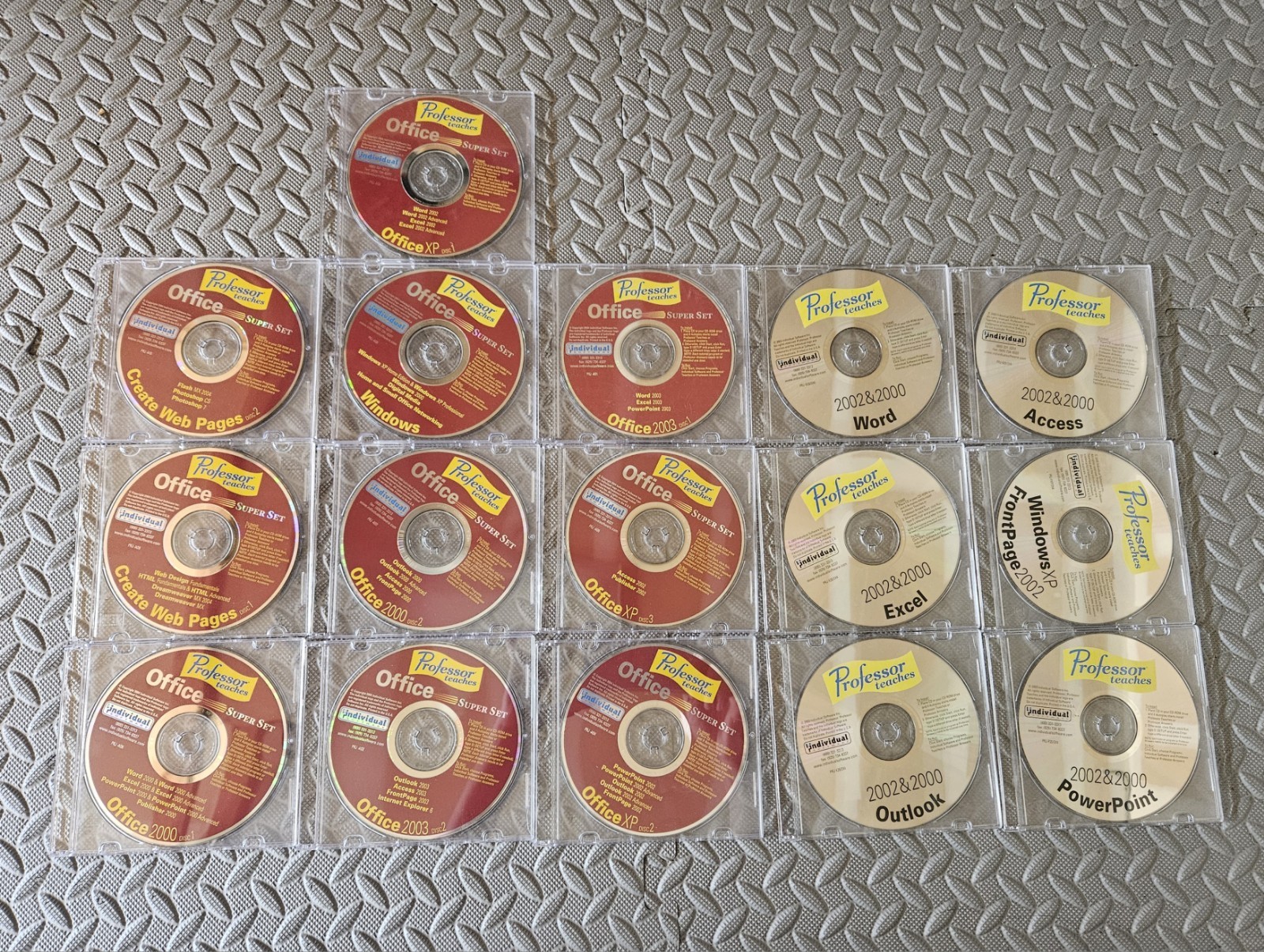 Professor Teaches Office 2000- 2002-2003 set. 16 cds