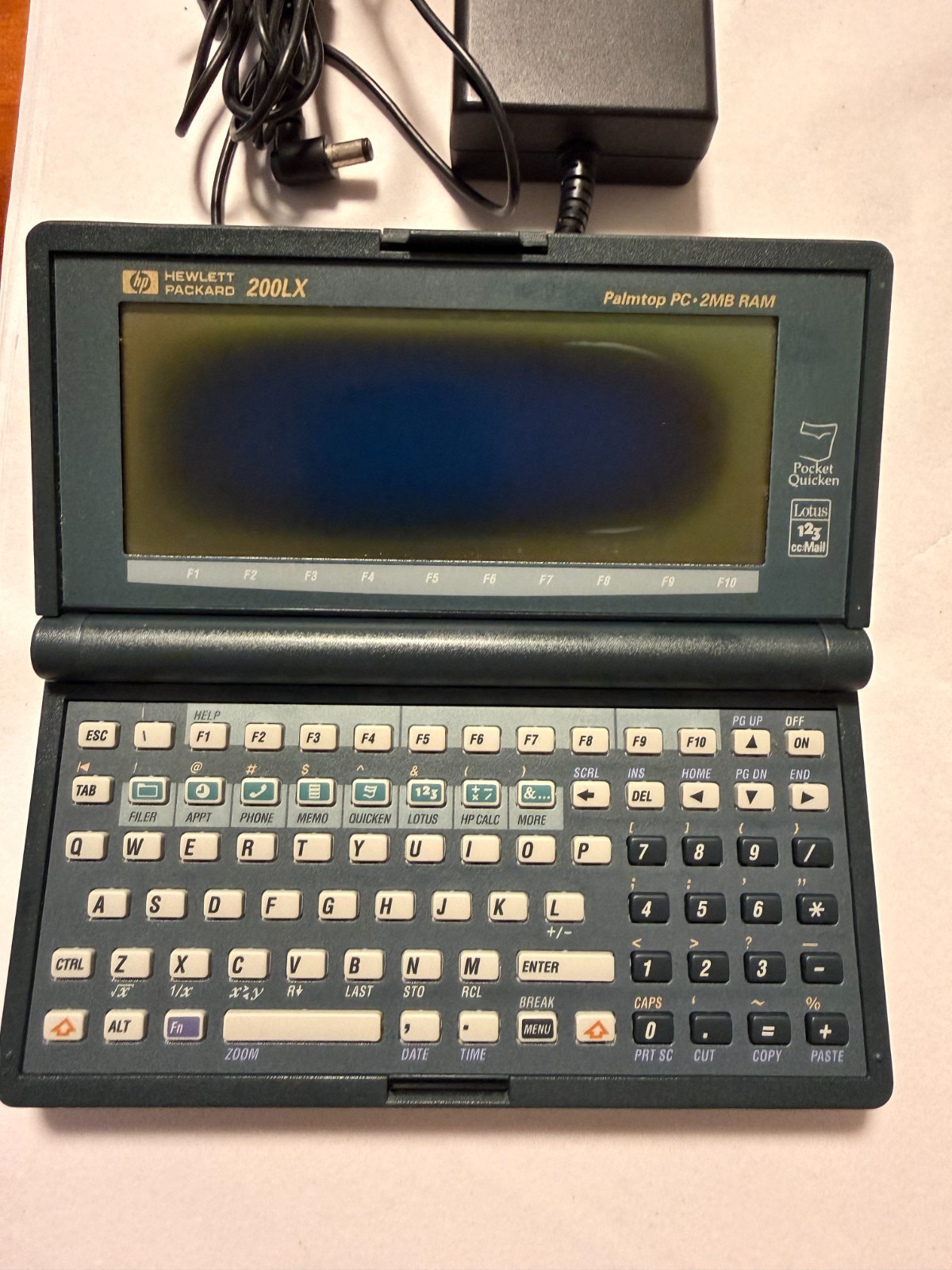 HP 200LX Palmtop PC 2MB RAM DOS Handheld + AC Adapter Case Manuals Catalog AS-IS