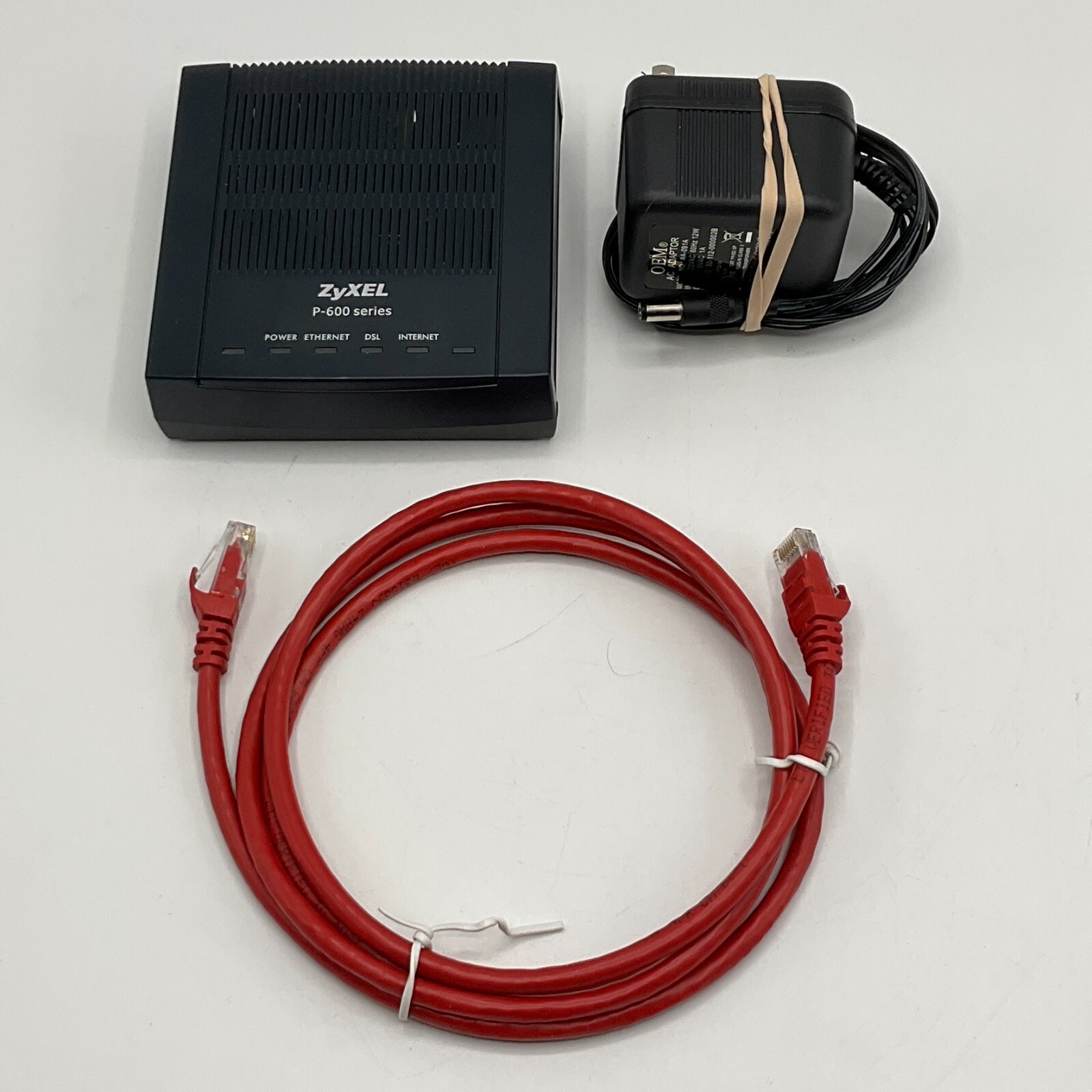 ZyXEL Communication Corporation Series P-660R-ELNK W/ AC Adapter and cable