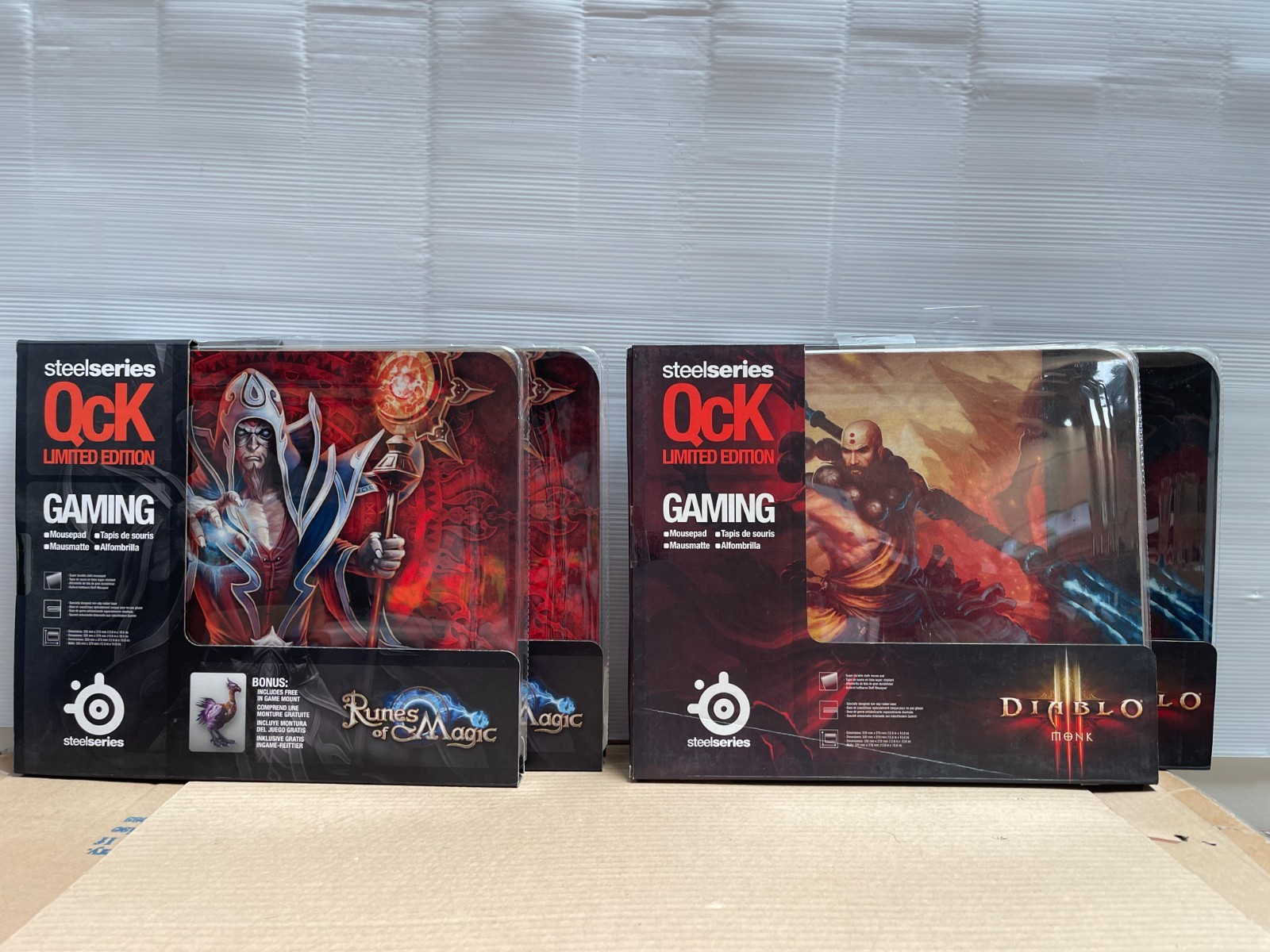 Bundle of four SteelSeries mousepads Runes of Magic and Diablo (Monk class).