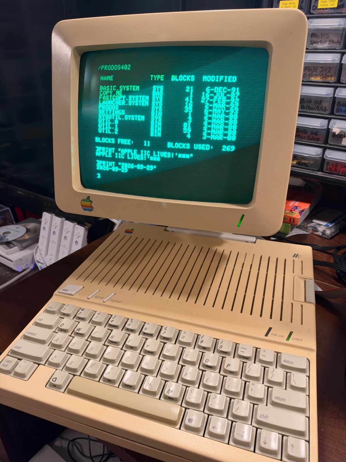 Apple IIc + matching Apple IIc monitor + modern USB-C power adapter