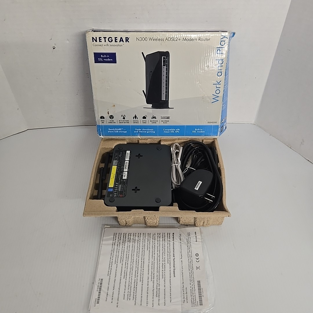 NETGEAR N300 Wireless DSL Modem Router ADSL2 + MODEM ROUTER Model DGN2200 w/box