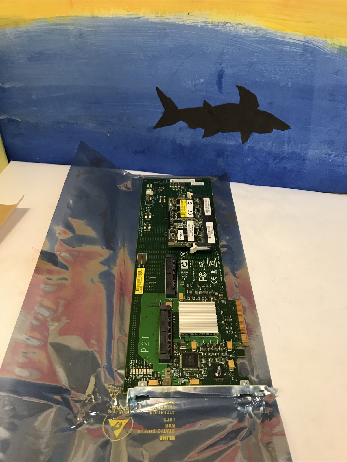 New HP Smart Array E200/128 BBWC PCI-E SAS Raid Controller 411508-B21/412799-001