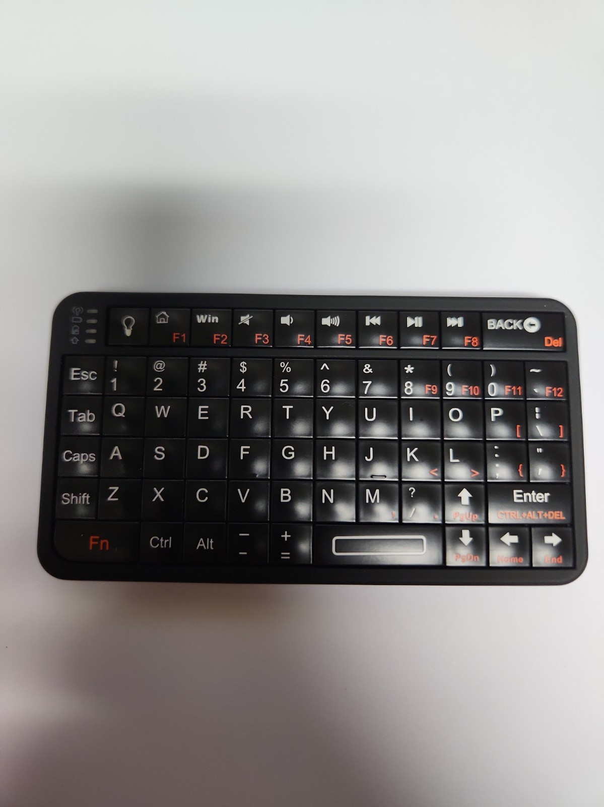 Mini Bluetooth Keyboard Wireless Qwerty 66 Keys Backlit Rechargeable Portable