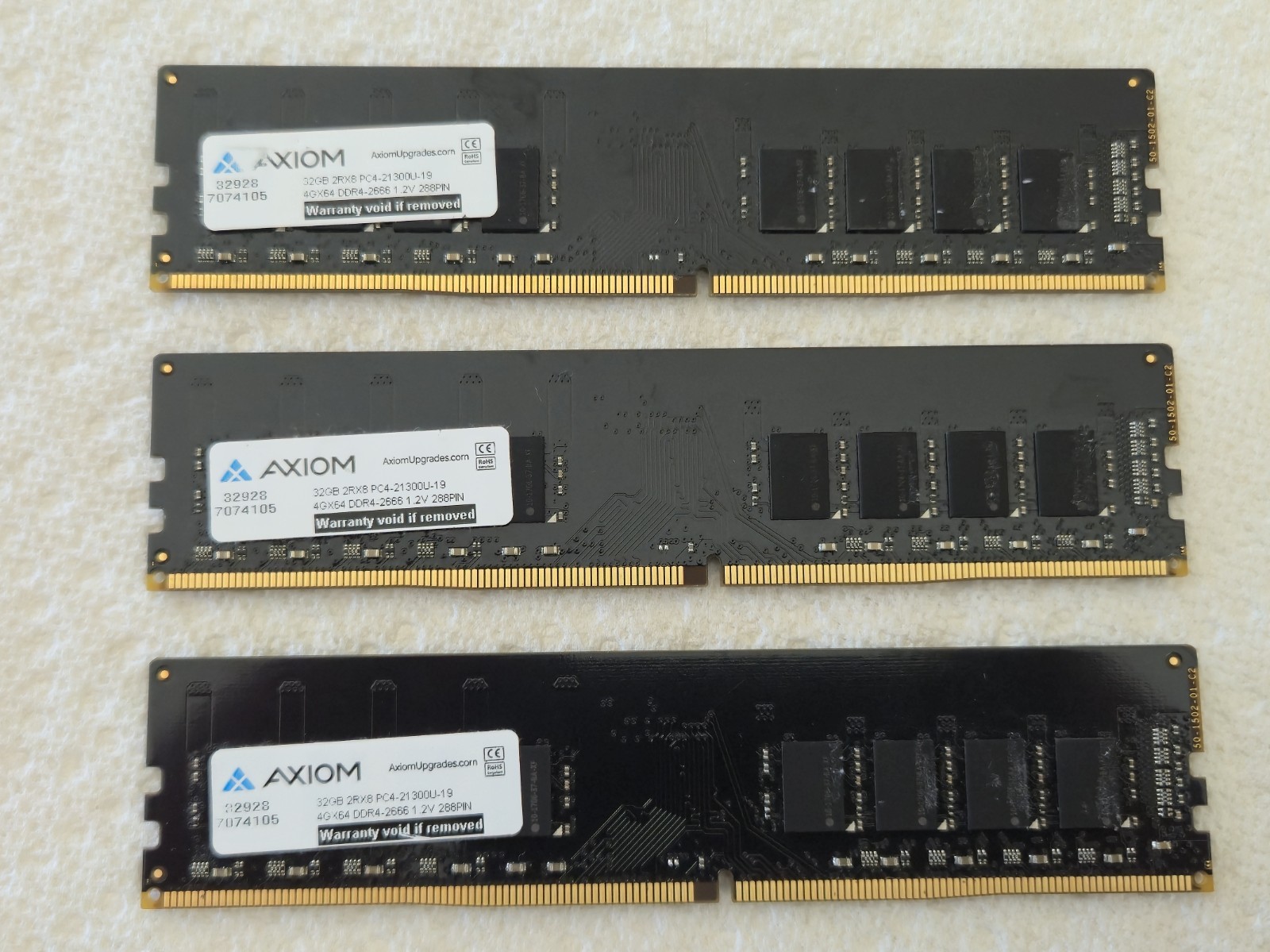 Lot of 3 AXIOM 32GB DDR4-2666 UDIMMS. Tested Good. May have minor scratches.