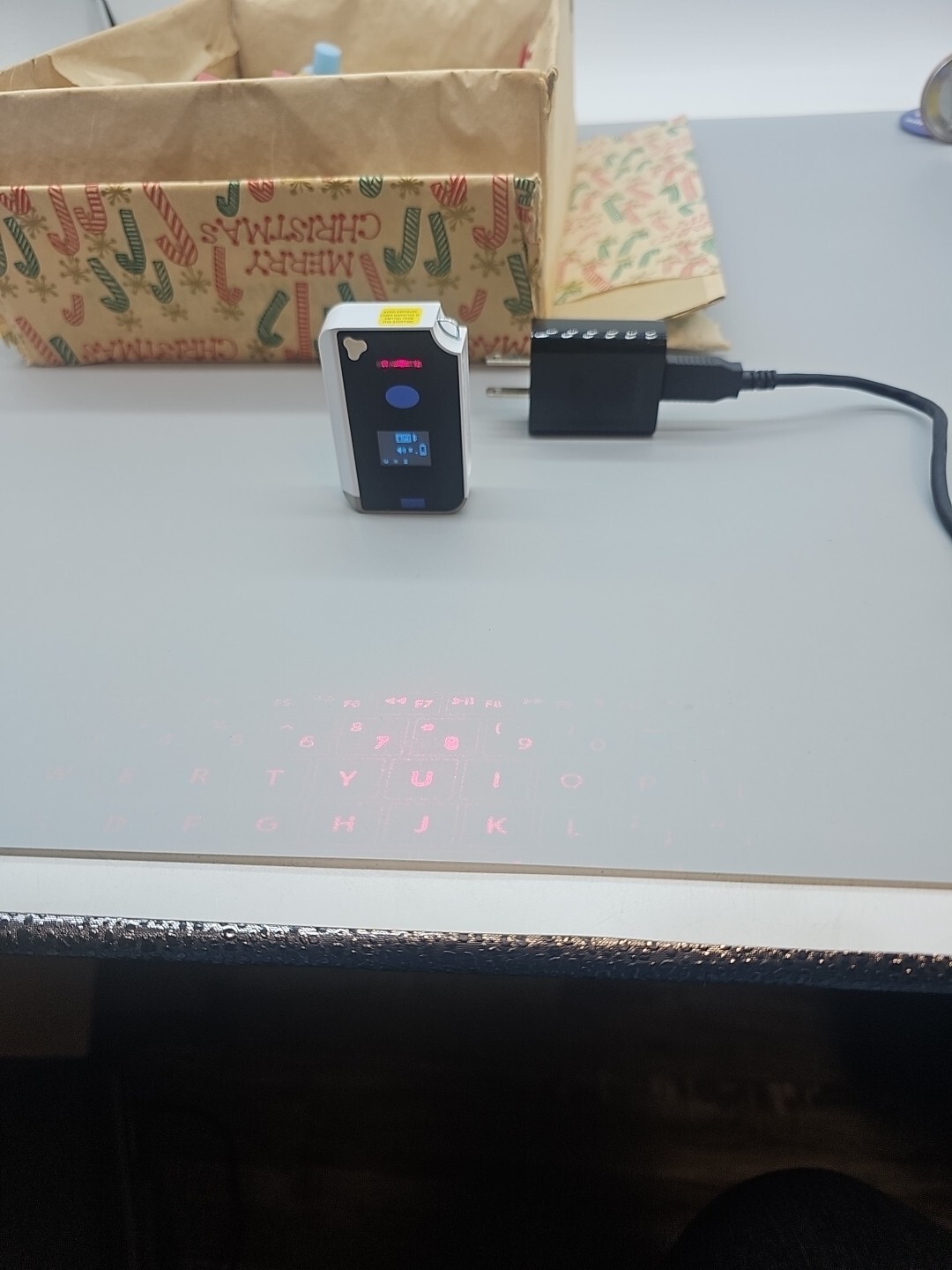 Brookstone CTX (Model: VK200 Keyfob) BT Virtual Bluetooth Keyboard
