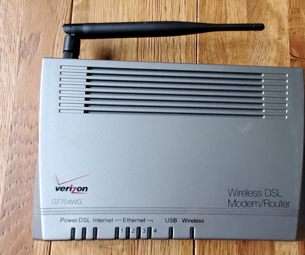 Verizion Actiontec GT704WG 54 Mbps 4-Port 10/100 Wireless G Router DSL Modem 