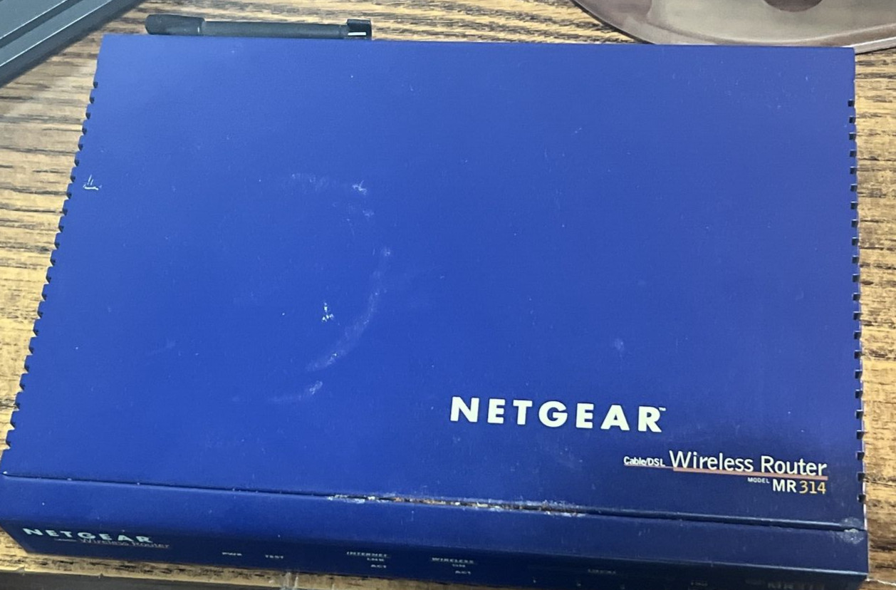 Netgear MR314 802.11b Wireless Cable/DSL Router with 4-Port Switch