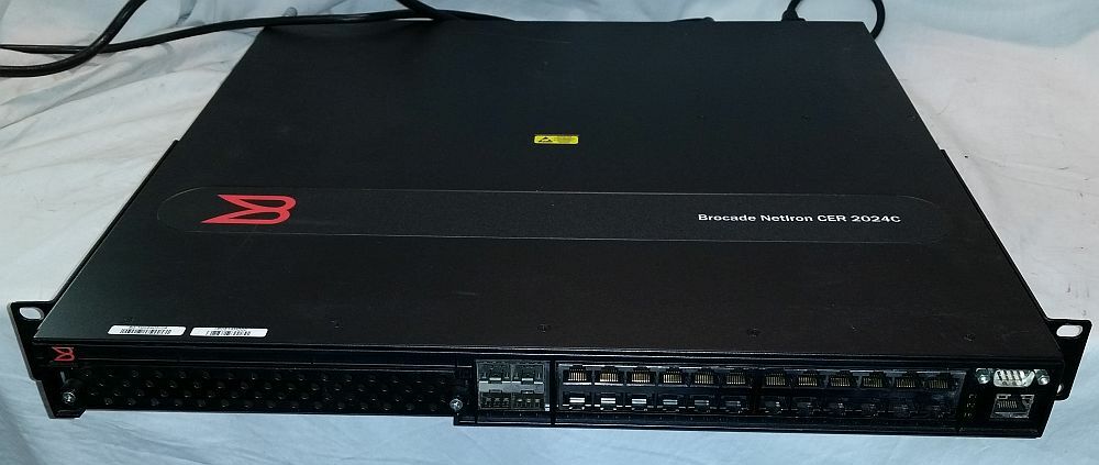 Brocade NetIron CER 2024C NI-CER-2024C-RT-AC 24x10/100/1000 2xPSU w/ Power Cords