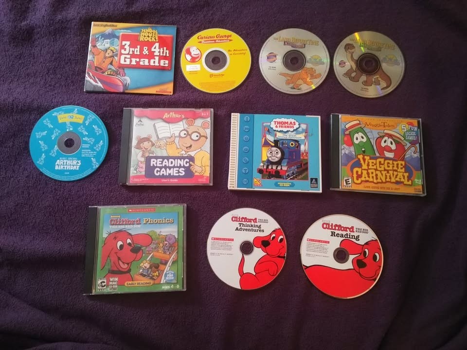 12 VINTAGE  LEARNING/HOMESCHOOL CD ROMS - CURIOUS GEORGE/THOMAS/CLIFFORD/ARTHUR+