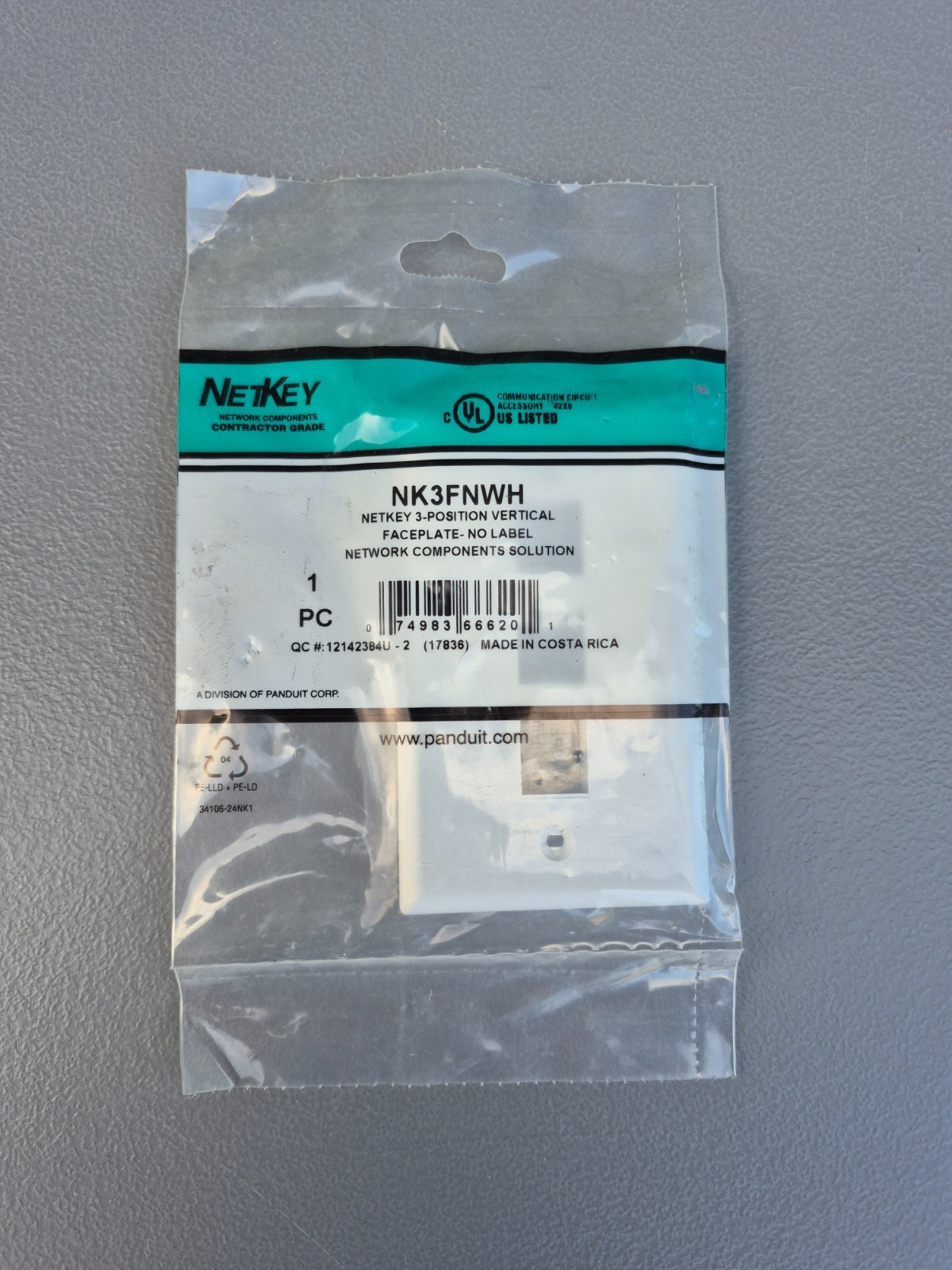 New Set of 14 PANDUIT NetKey Vertical Faceplate, 3-Port, White MFR #: NK3FNWH