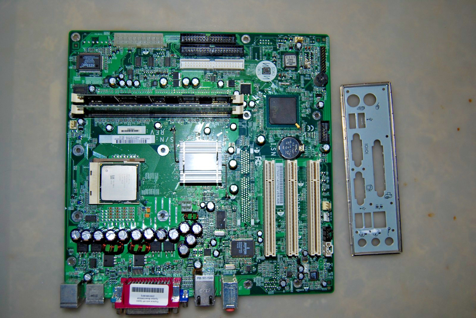 HP 333542-001 skt 478 845GV motherboard with 2.8Ghz CPU, 512mb RAM and I/O plate
