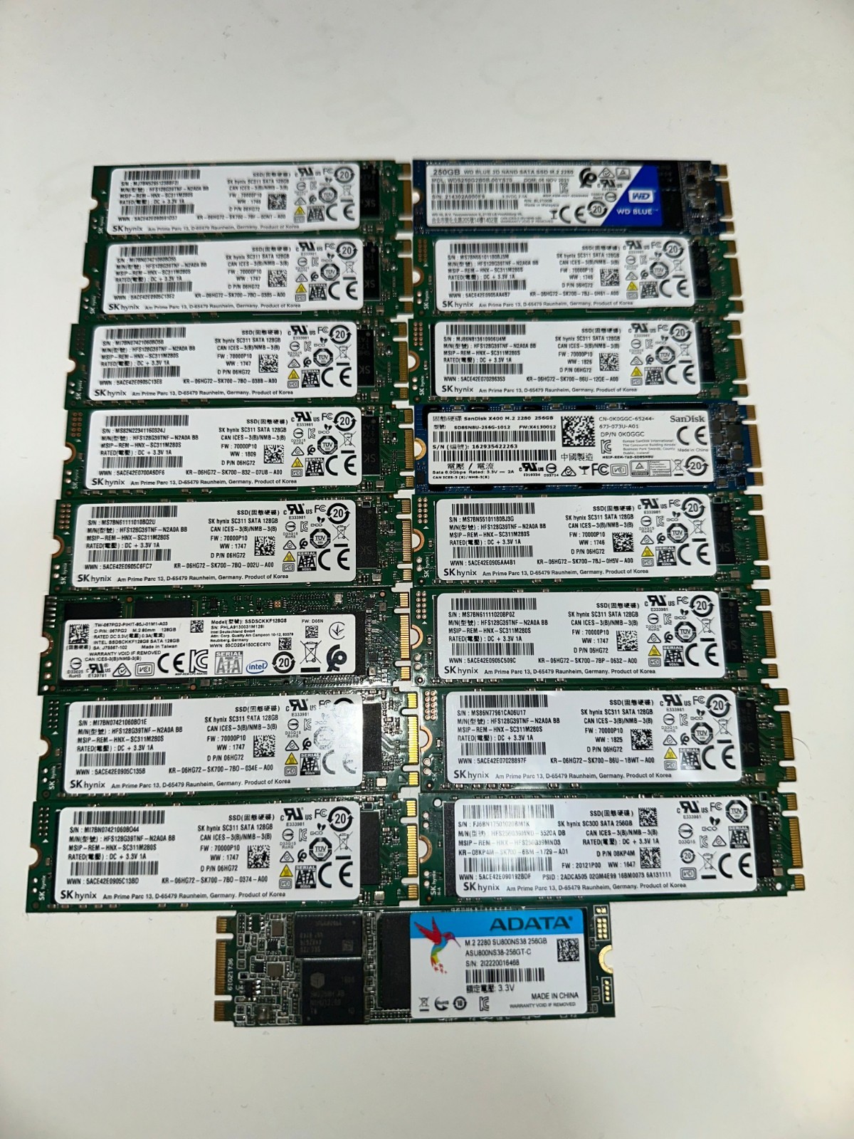Lot of 17 SK Hynix, SanDisk, Intel 128GB, 250GB, 256GB M.2 SATA SSD