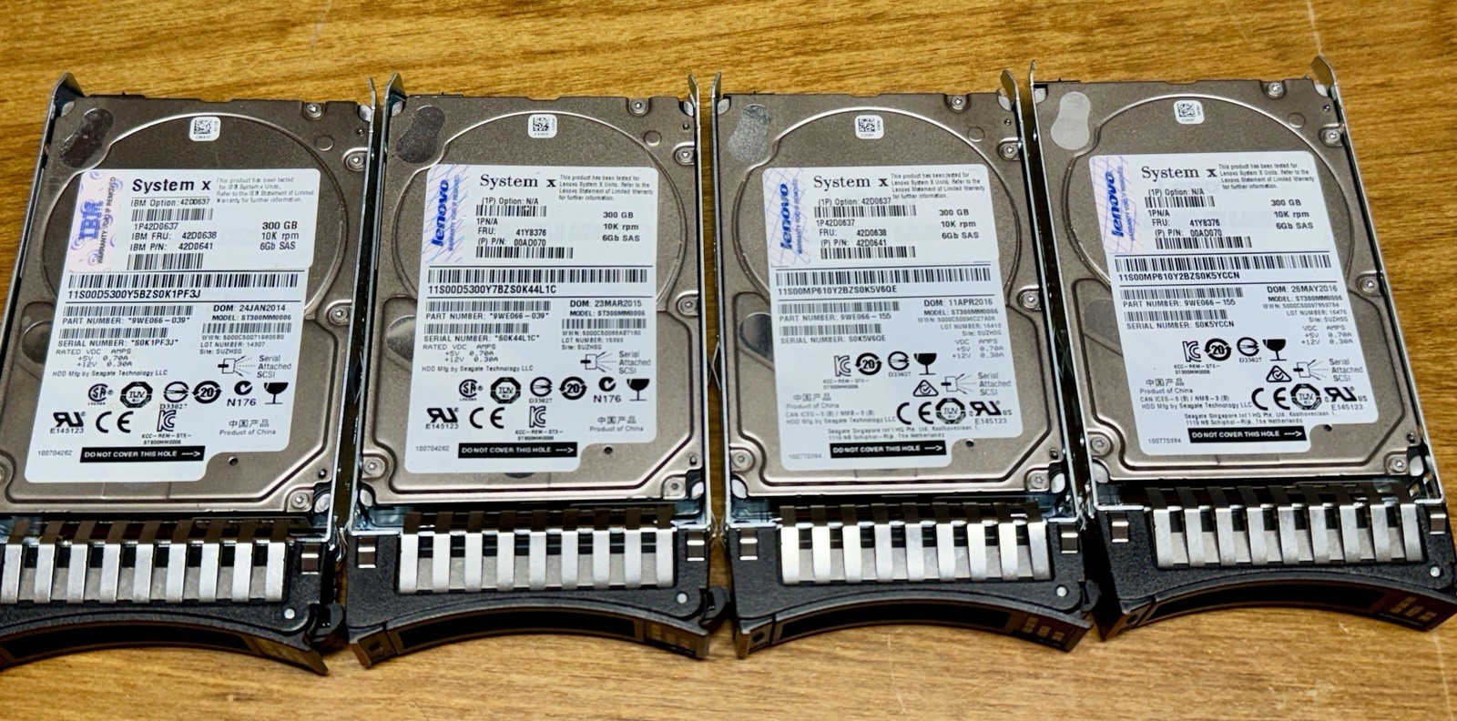 Lot of 4 IBM 300GB 10K 6Gb SAS 2.5” HDD w/ System x Caddies 42D0638 42D0641
