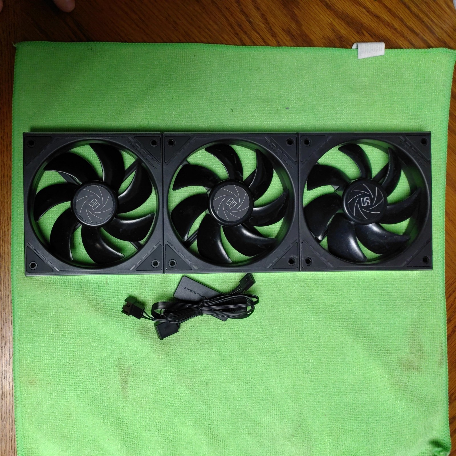 Thermalright TL‑M12QR X3 Black 120mm Reverse Blade PC Case Fan (set of three)
