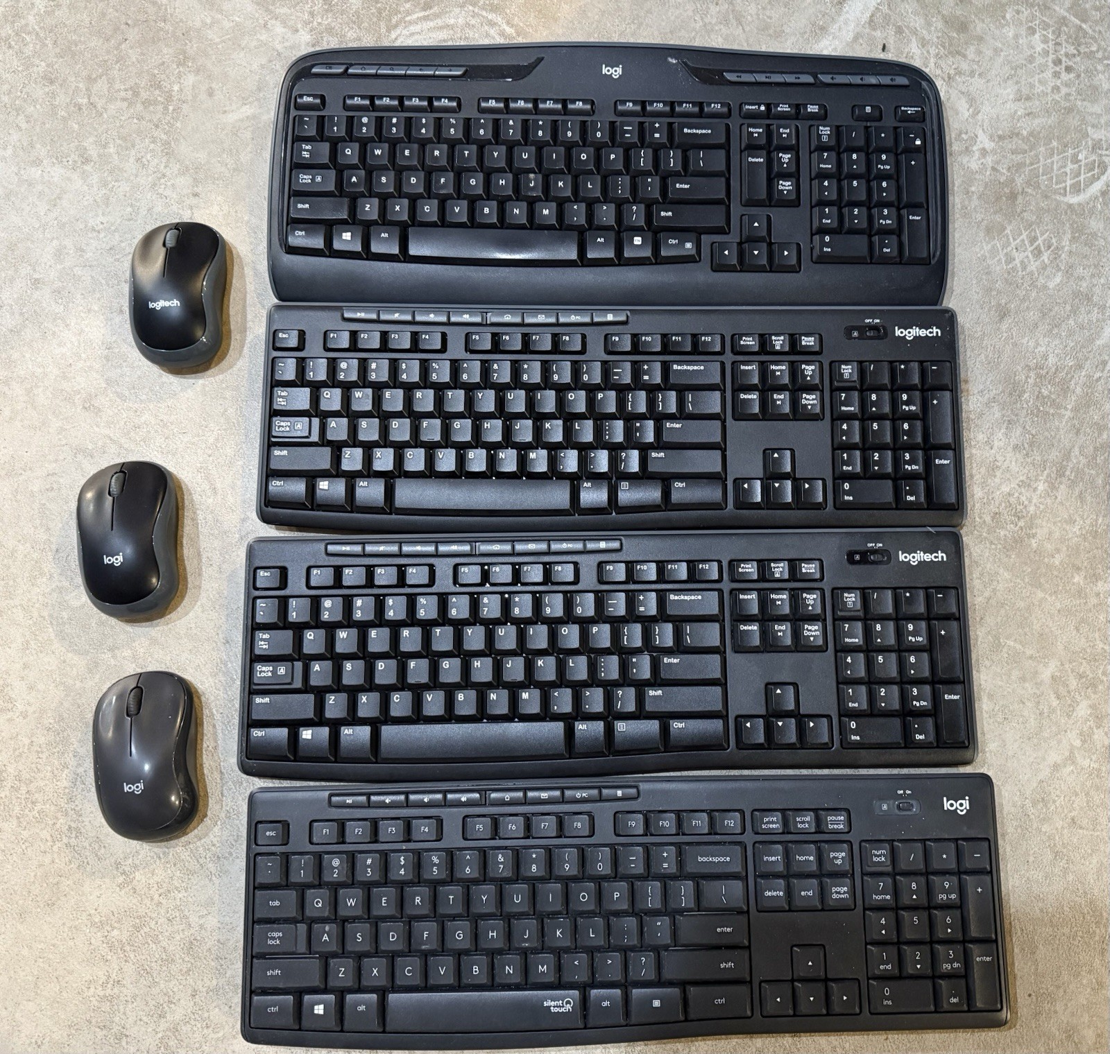 4 Wired Logitech Keyboards and 3 Mouse   (New)