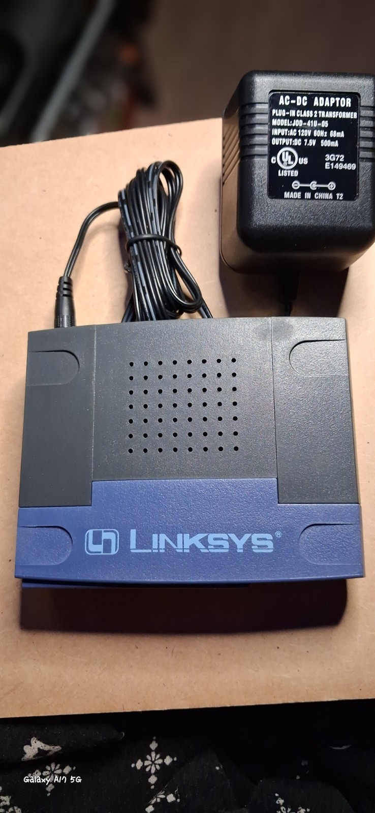 Vintage Lynksys blue and dark grey EtherFast 10/100 workgroup with pwr supply.