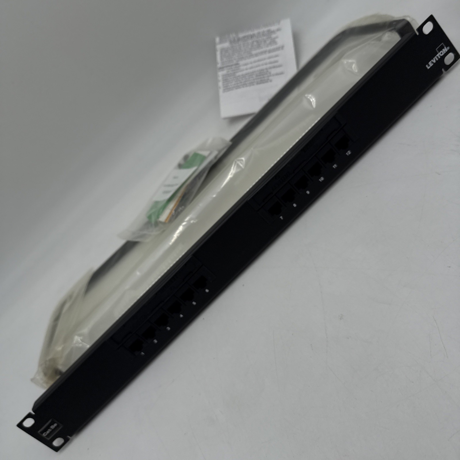 Leviton 252-5G596-U12 12-Port Patch Block Cat 5E Flat Panel 110 Style 1RU