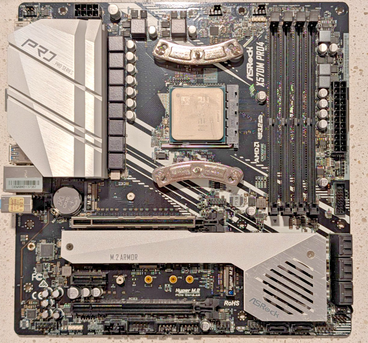 asrock x570m pro4 + AMD Ryzen 7 5800X microATX motherboad and CPU combo