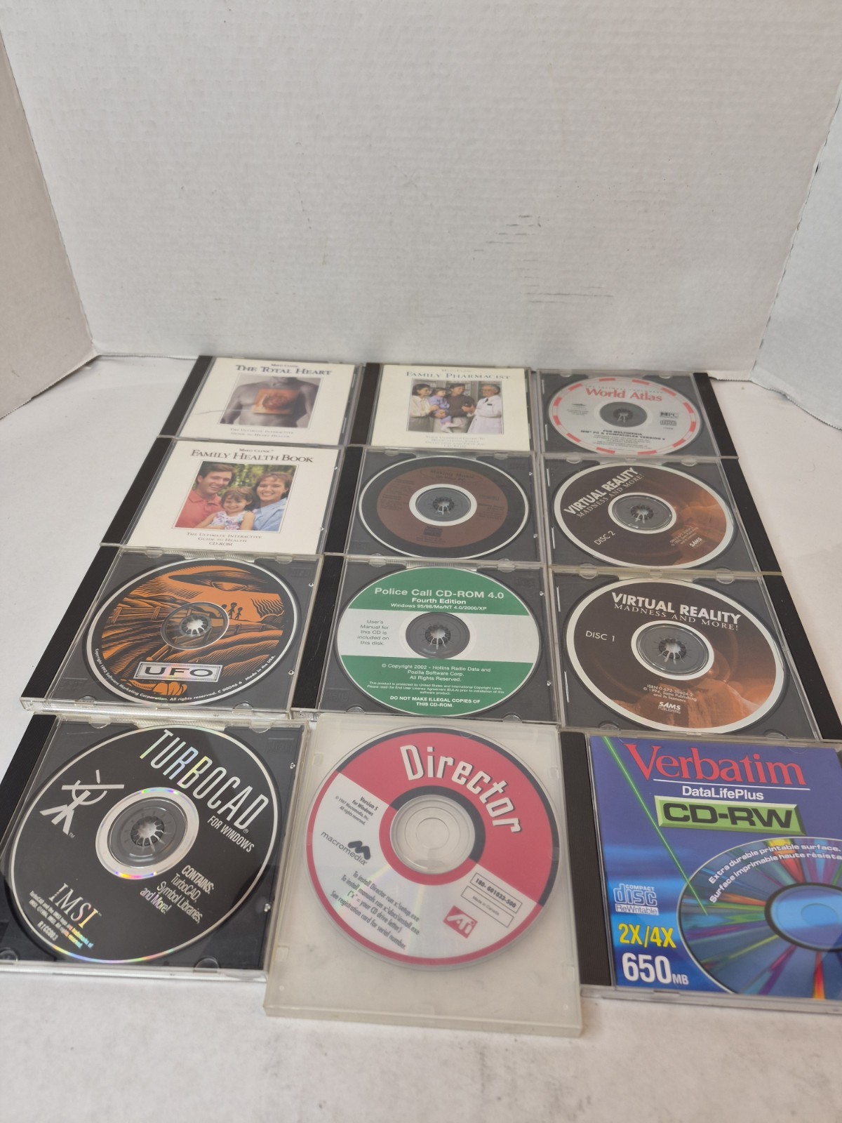 Vintage Lot Of 12 PC CD-ROM Virtual Reality World Atlas Police Call UFO Etc