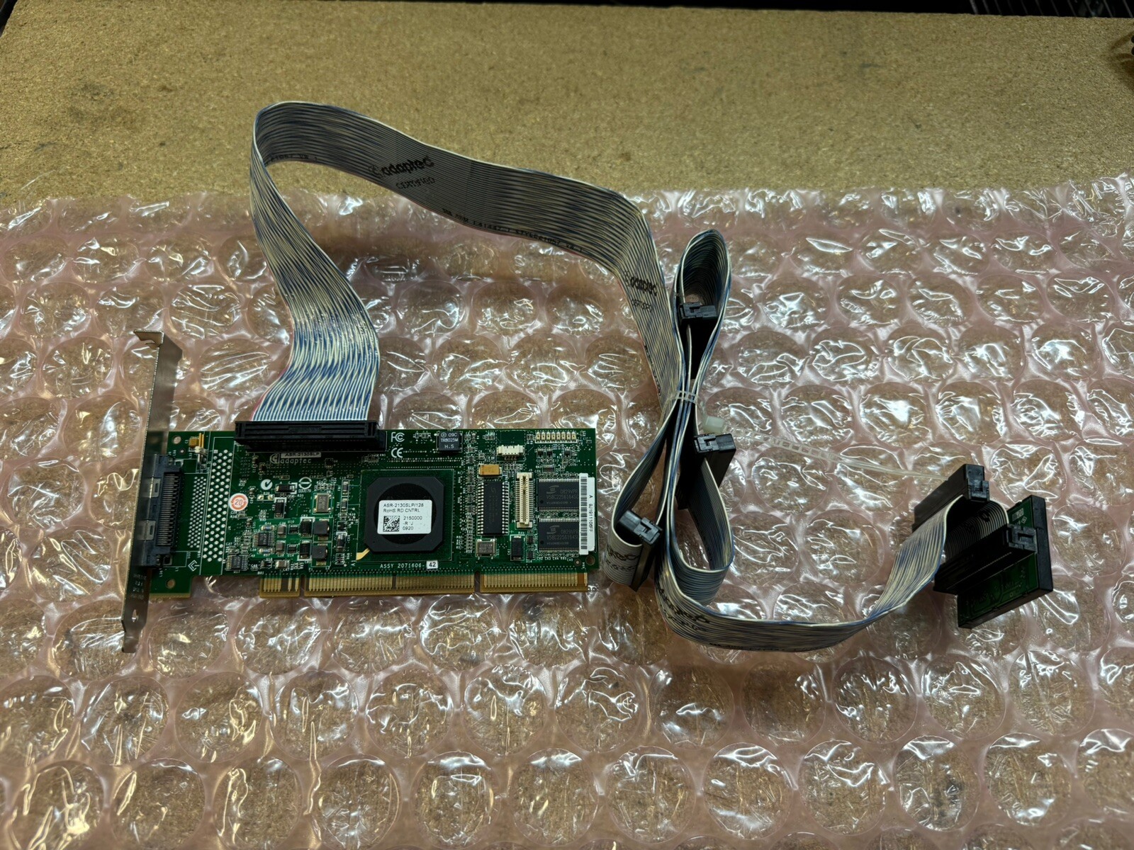 Adaptec ASR-2130SLP/128MB Ultra320 PCI-X SCSI 64-bit 133MHz 128MB Cache w/ Cable