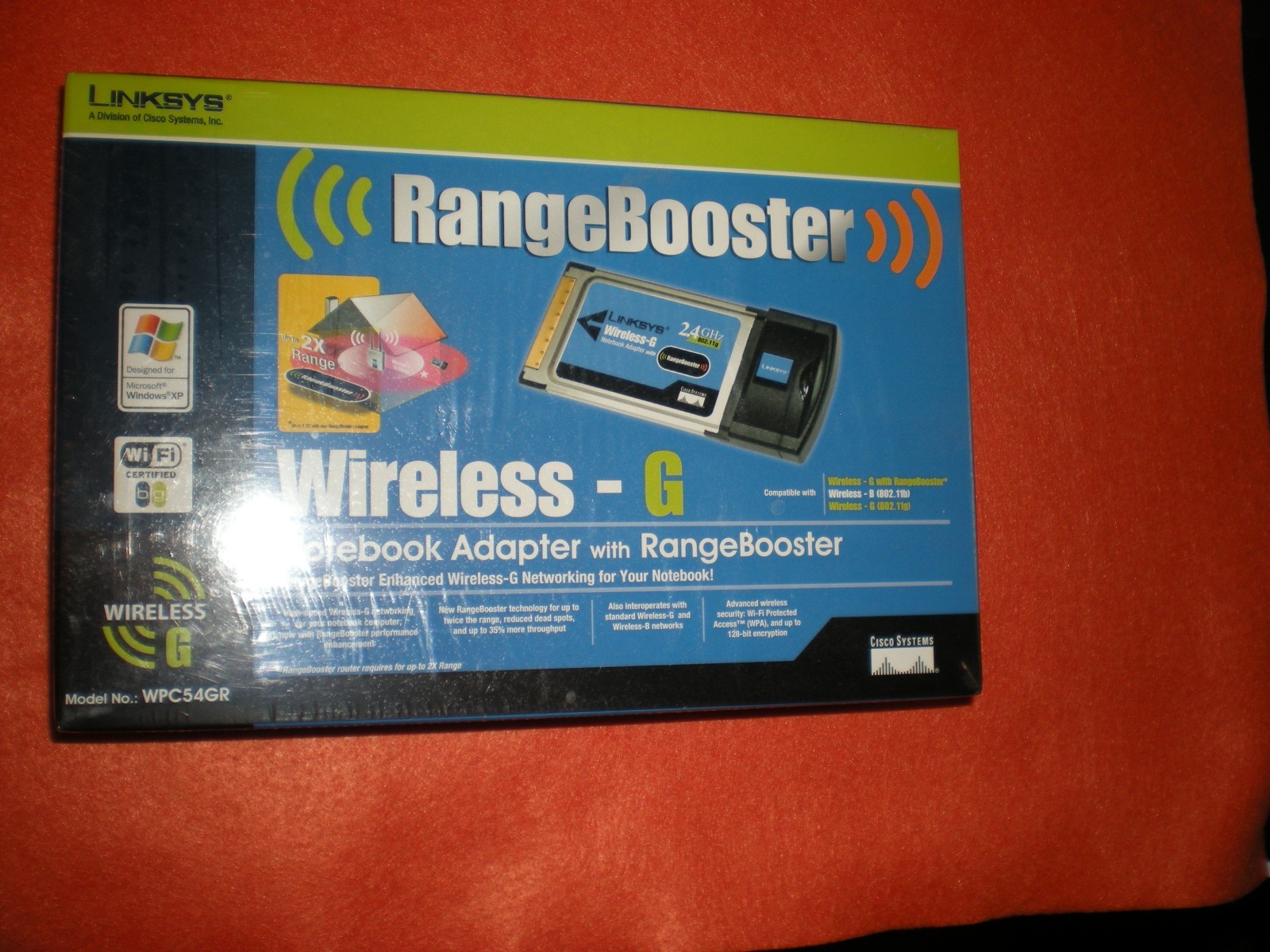 Linksys Network Adapter / Range Booster, PCMCIA, Factory Sealed Retail box