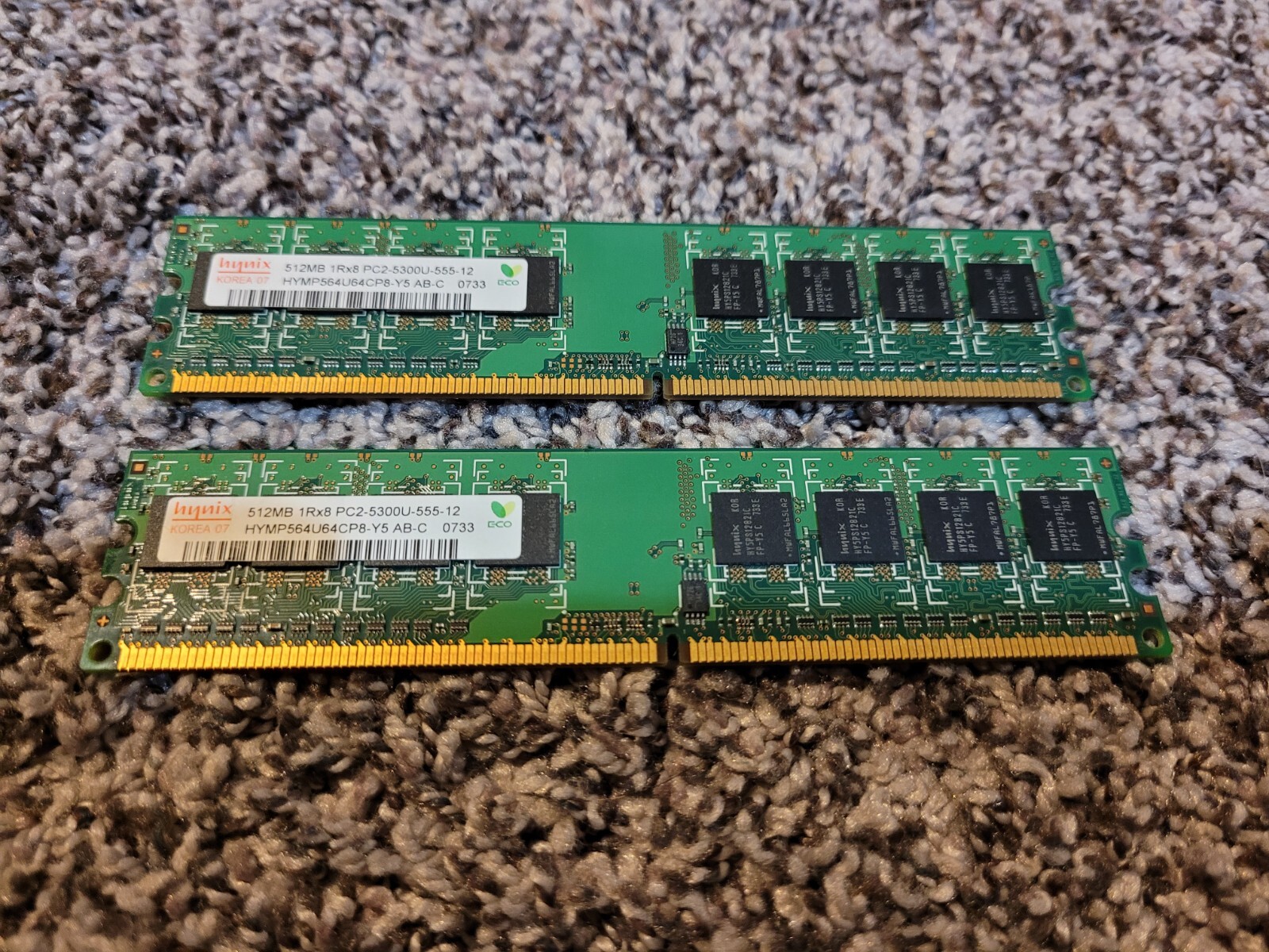 Quantity of Two 512MB Hynix PC2-5300U-555 HYMP564U64CP8-Y5 AB-C RAM Sticks