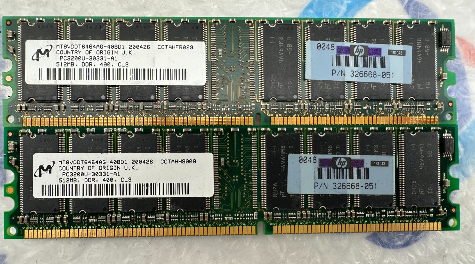 2x Micron MT8VDDT6464AG-40BD1 PC3200U 512MB DIMM DDR 400  Memory HP 326668-051