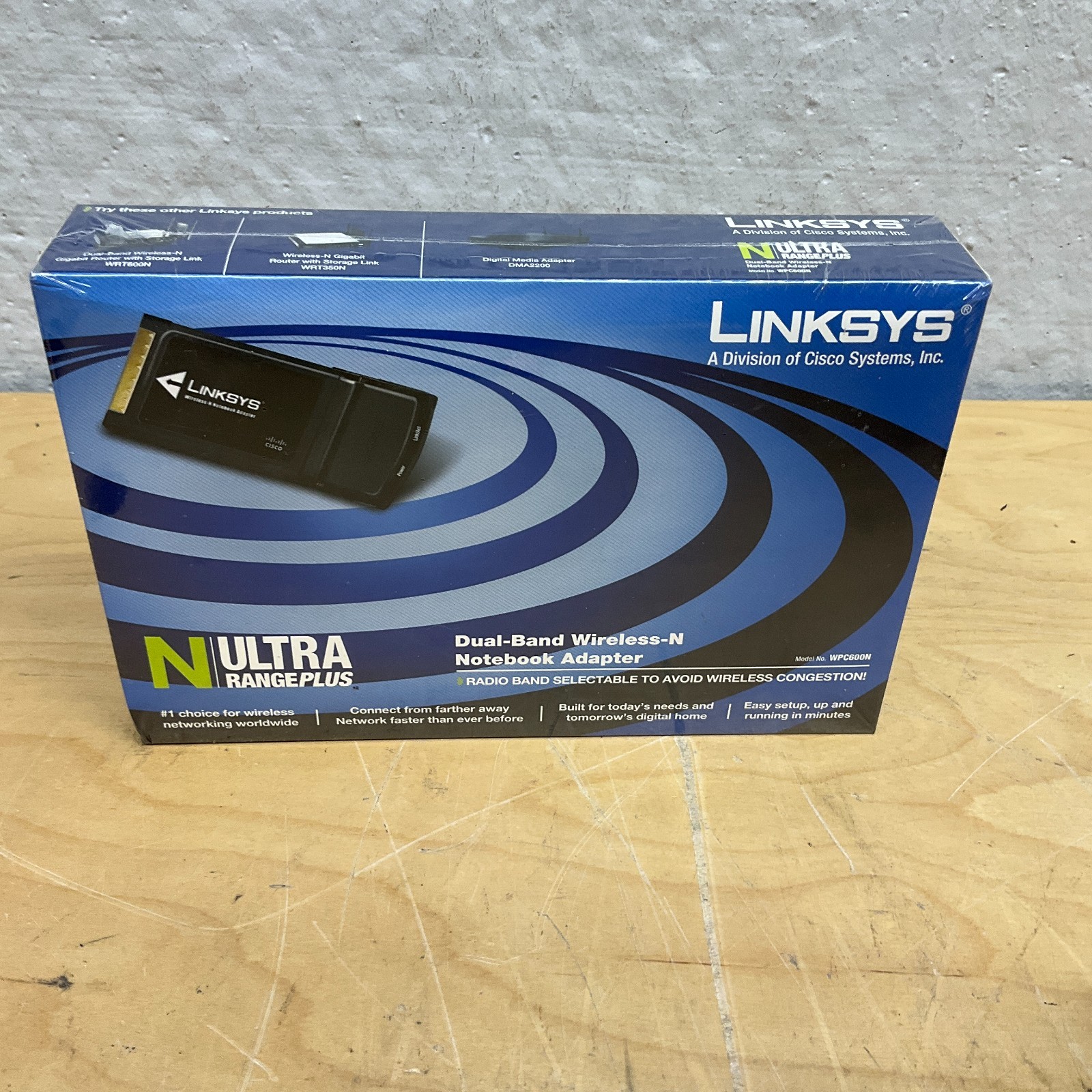 Linksys By Cisco (WPC600N) Dual-Band Wireless-N Notebook Adapter - New Sealed