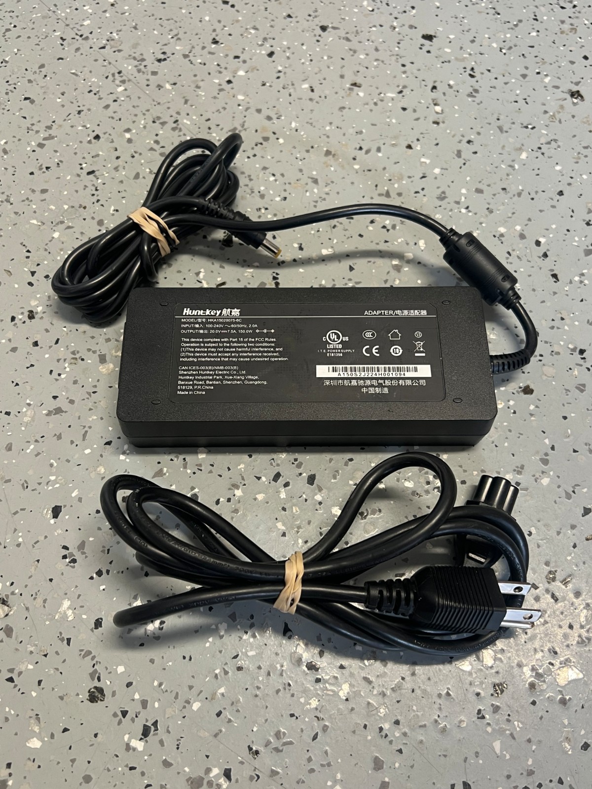 Genuine OEM Huntkey HKA15020075-6C 20VDC 7.5A 150W Large Port w/ Power Adapter