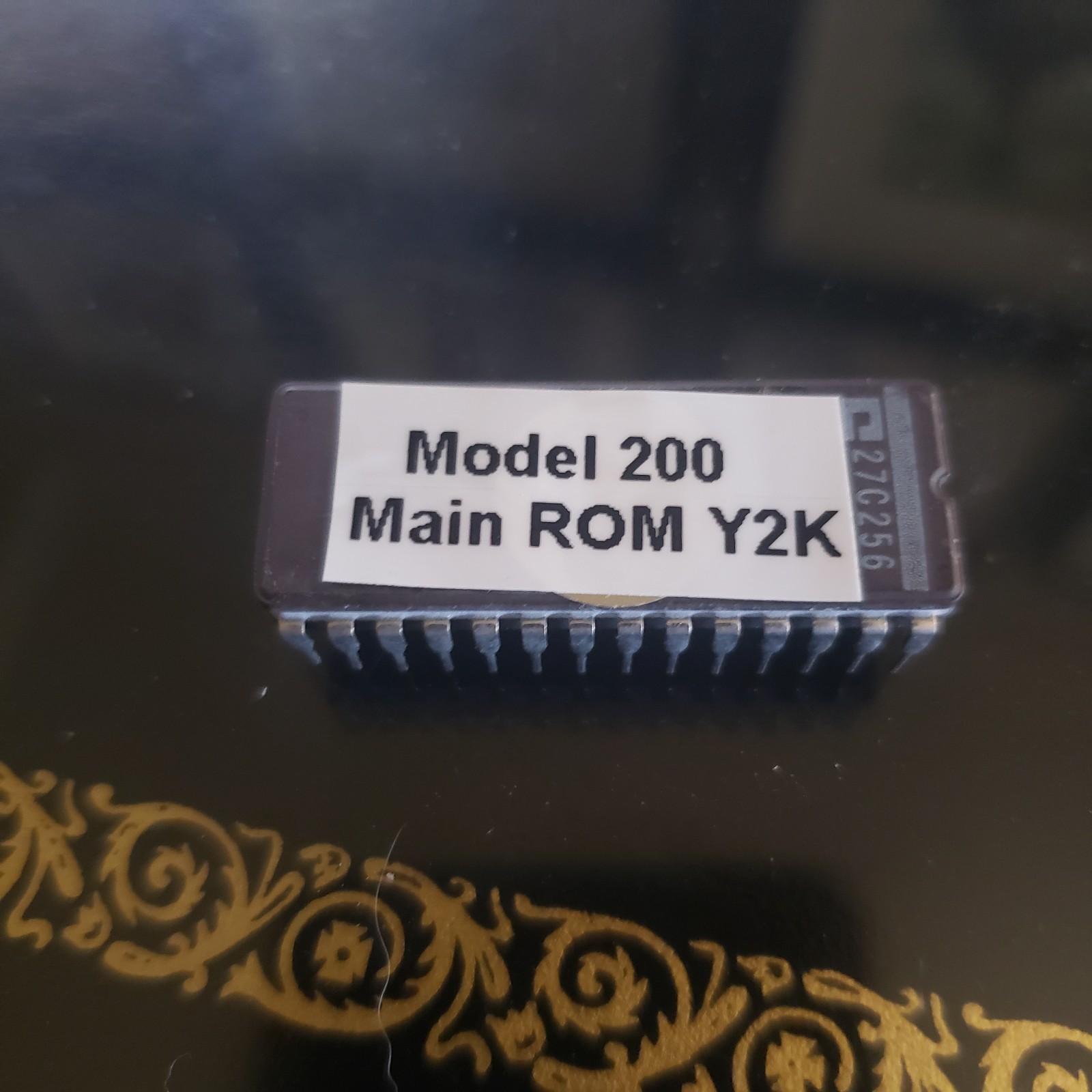 Y2K ROM for the Tandy Radio Shack Model 200 Portable Computer.