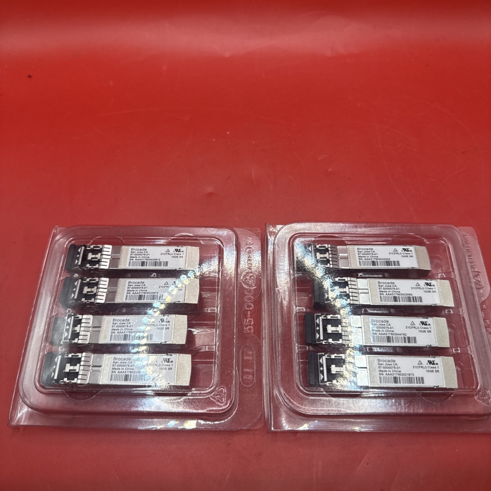 Lot of 8 Brocade 57-0000075-01 10GE SR SFP+ Transceivers.