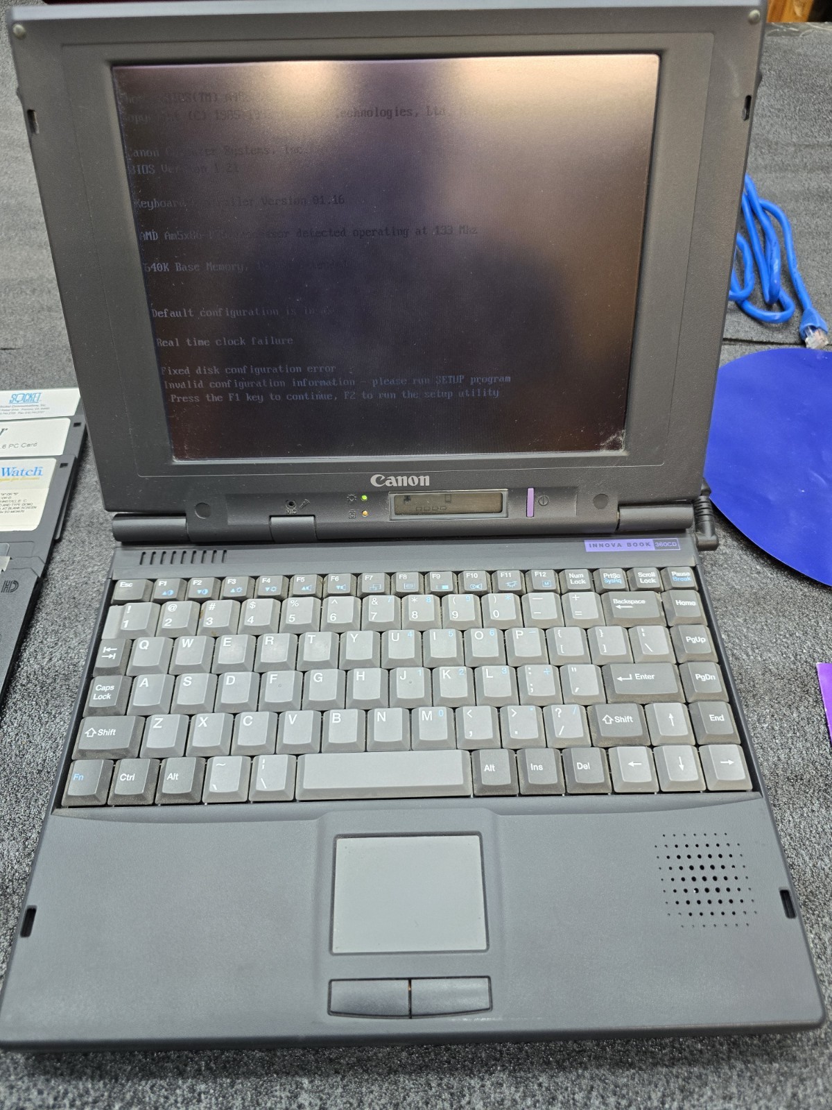 VINTAGE  Canon Innova Book 360CD Powers On With Case Extras