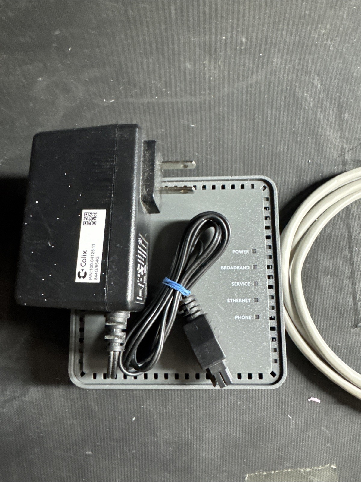 CALIX Gigapoint GP100X with PWR Supply and Ethernet Cable. P/N: 100-05463