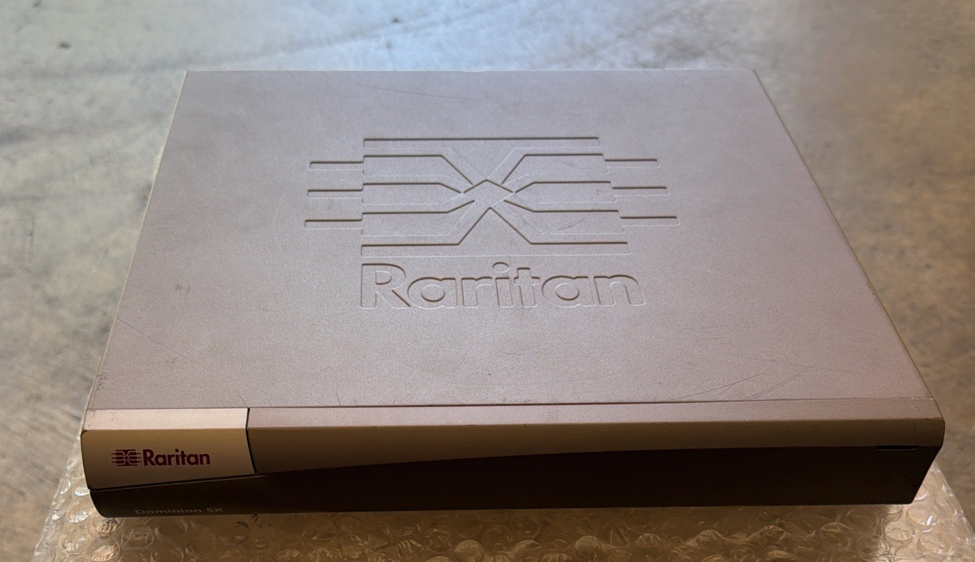 Raritan Dominion DSXB-4-M with internal modem 4x port RJ45 Serial Console Server