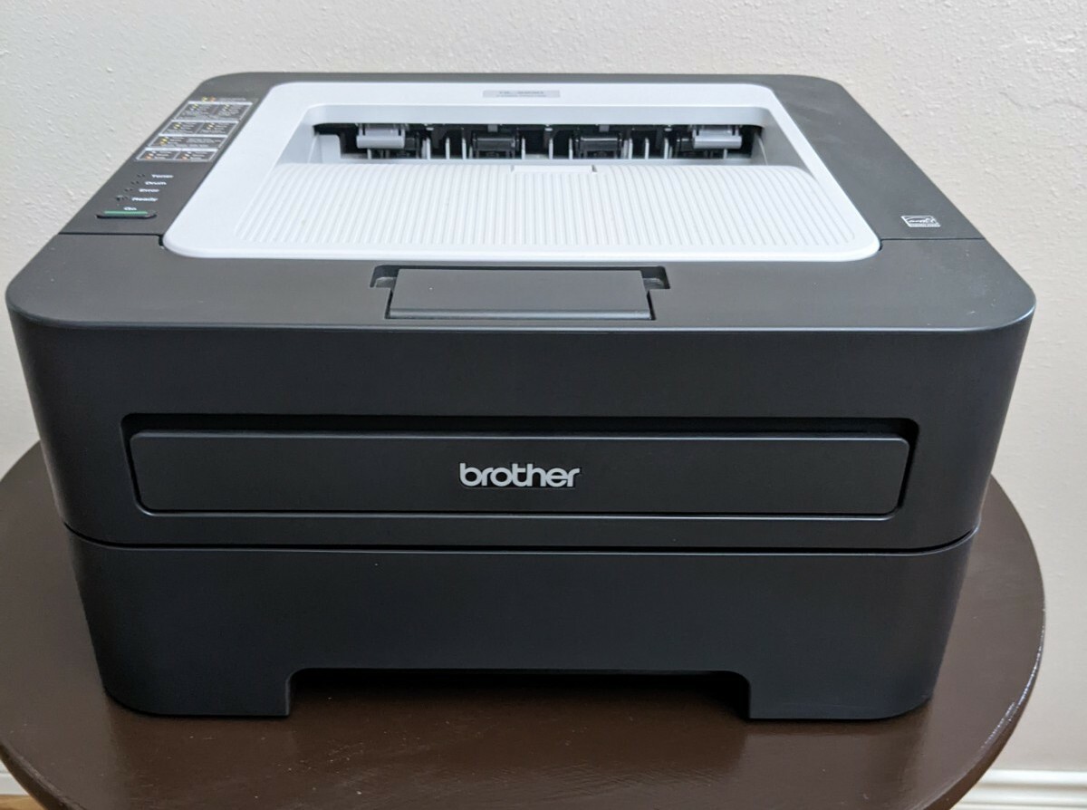 Gently Used Brother HL-2230 printer with 2 NEW Toner and 1 NEW Drum