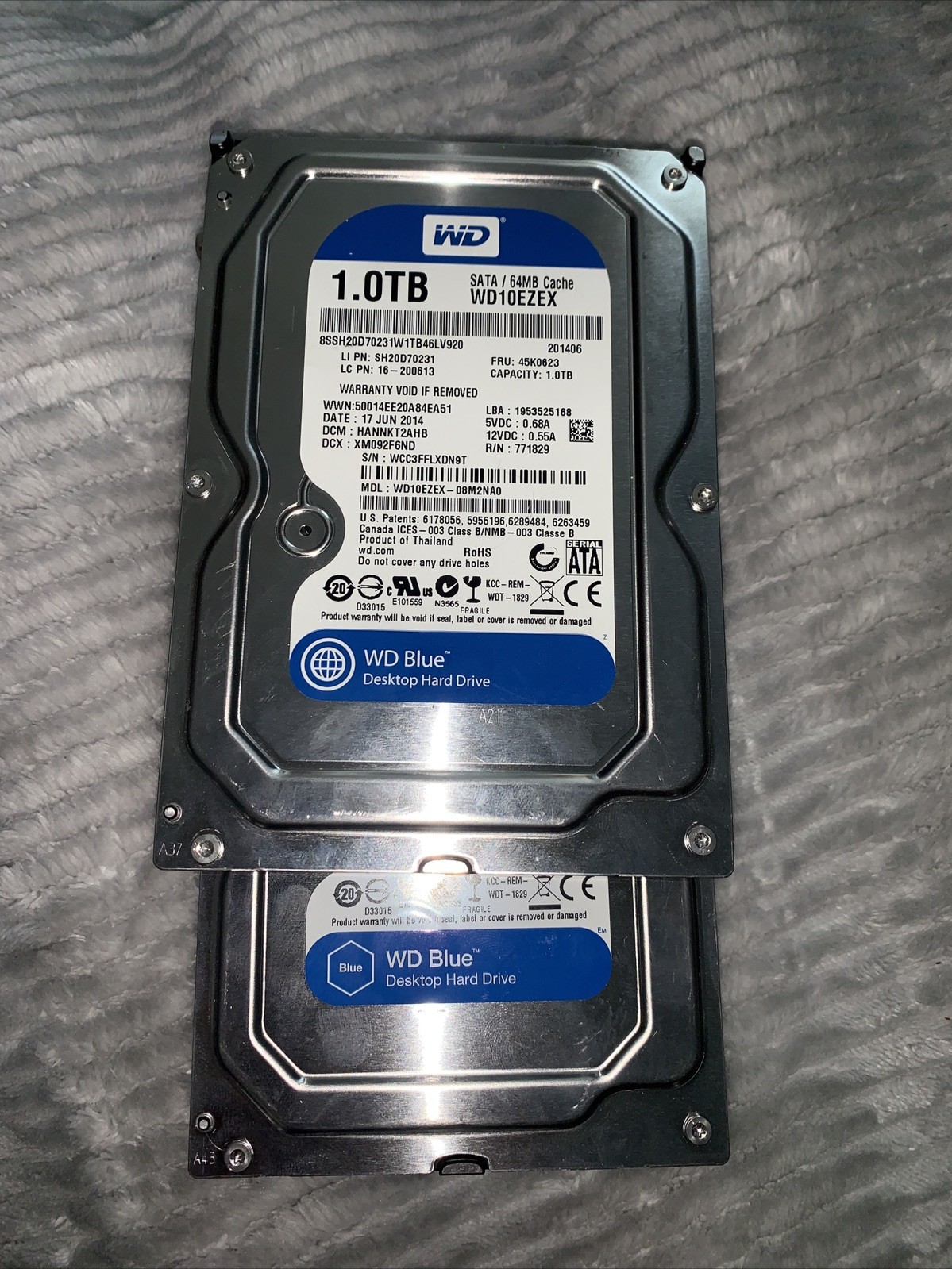 2  Used Western Digital (WD) Blue 1.0TB Desktop Hard Drive, model WD10EZEX.
