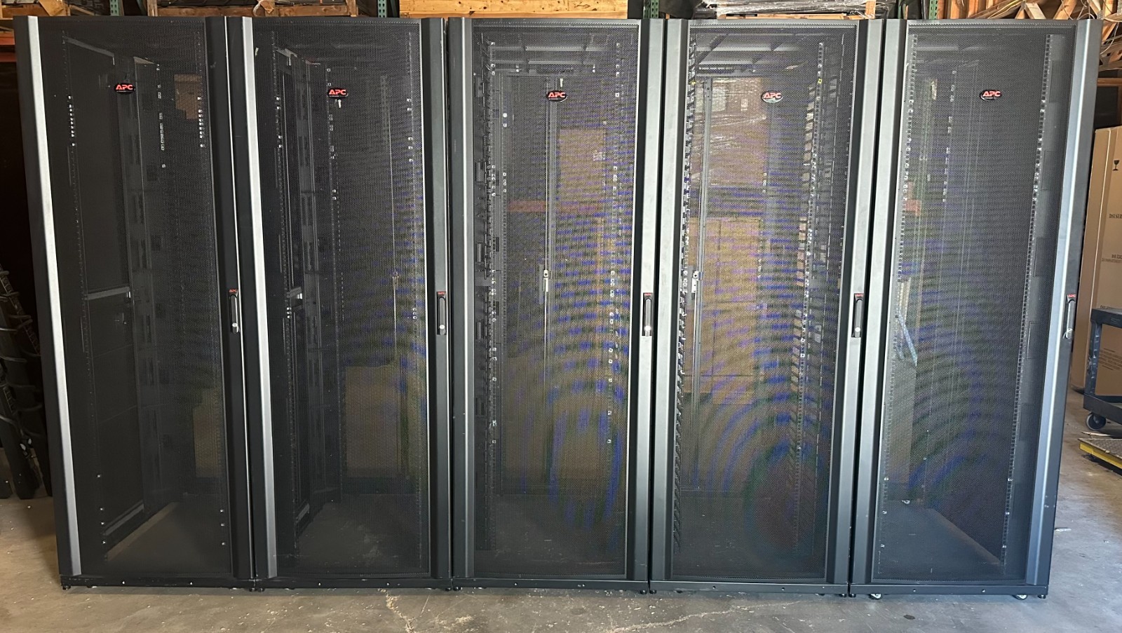 Used row of qty 5, APC AR3355, "B" grade, Server Rack Cabinet Enclosure, 45U