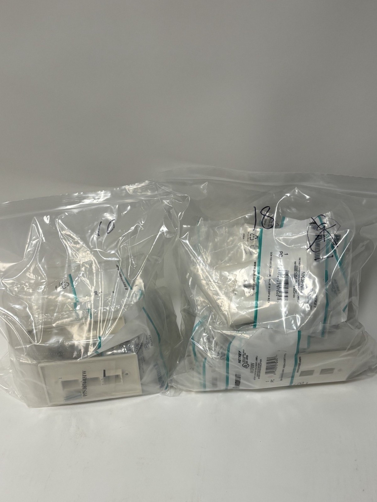 Panduit NK3FNIW NetKey 3-Port Faceplate, International White-28pk