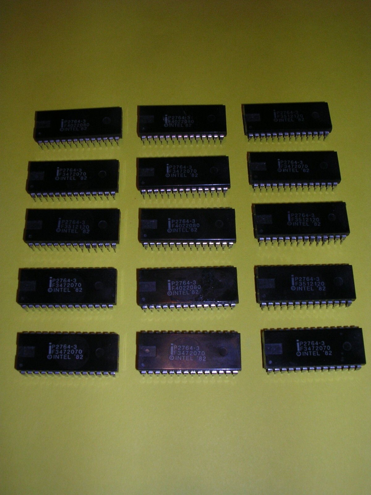 Fifteen (15) Intel P2764-3 64K-Bit (8192 x 8) PROM Chips