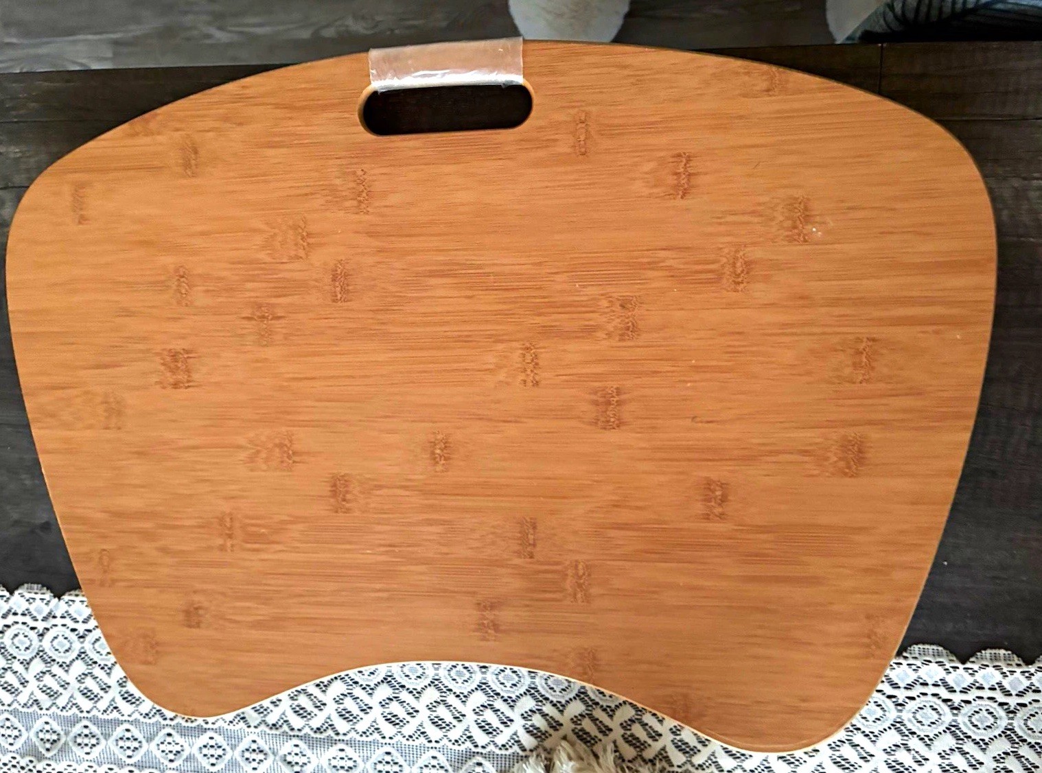 natural bamboo lap desk with ergonomic curved edge and carrying handle