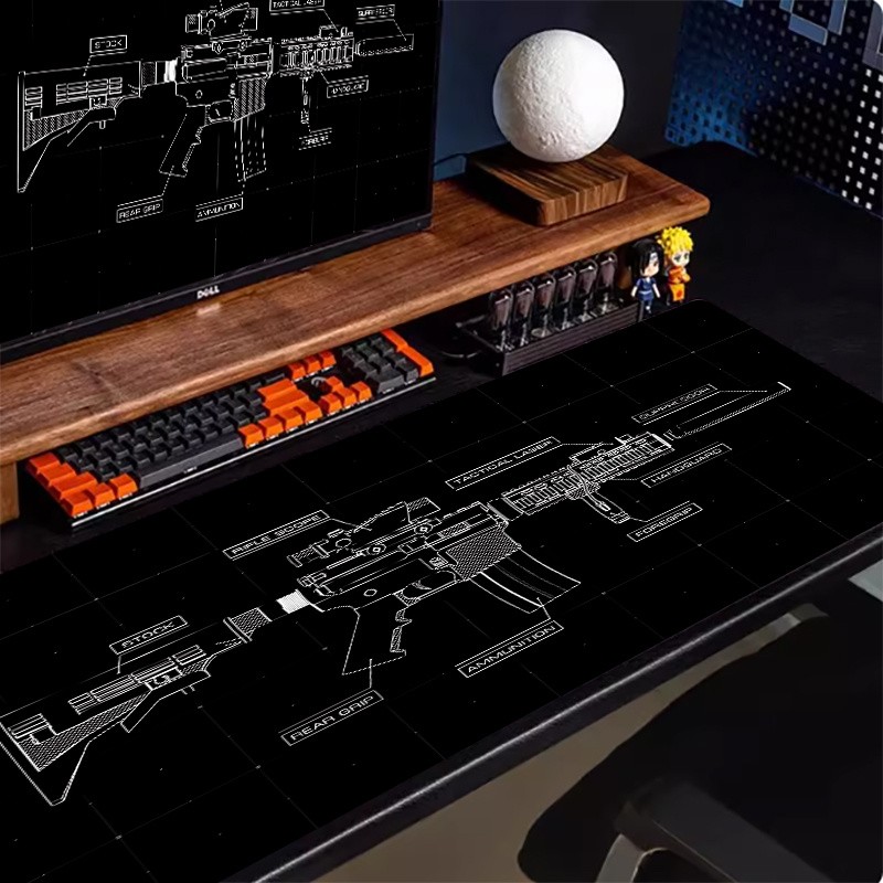 A Large Gaming Mouse Pad Featuring a Gun Blueprint Design, Ideal for Electroni