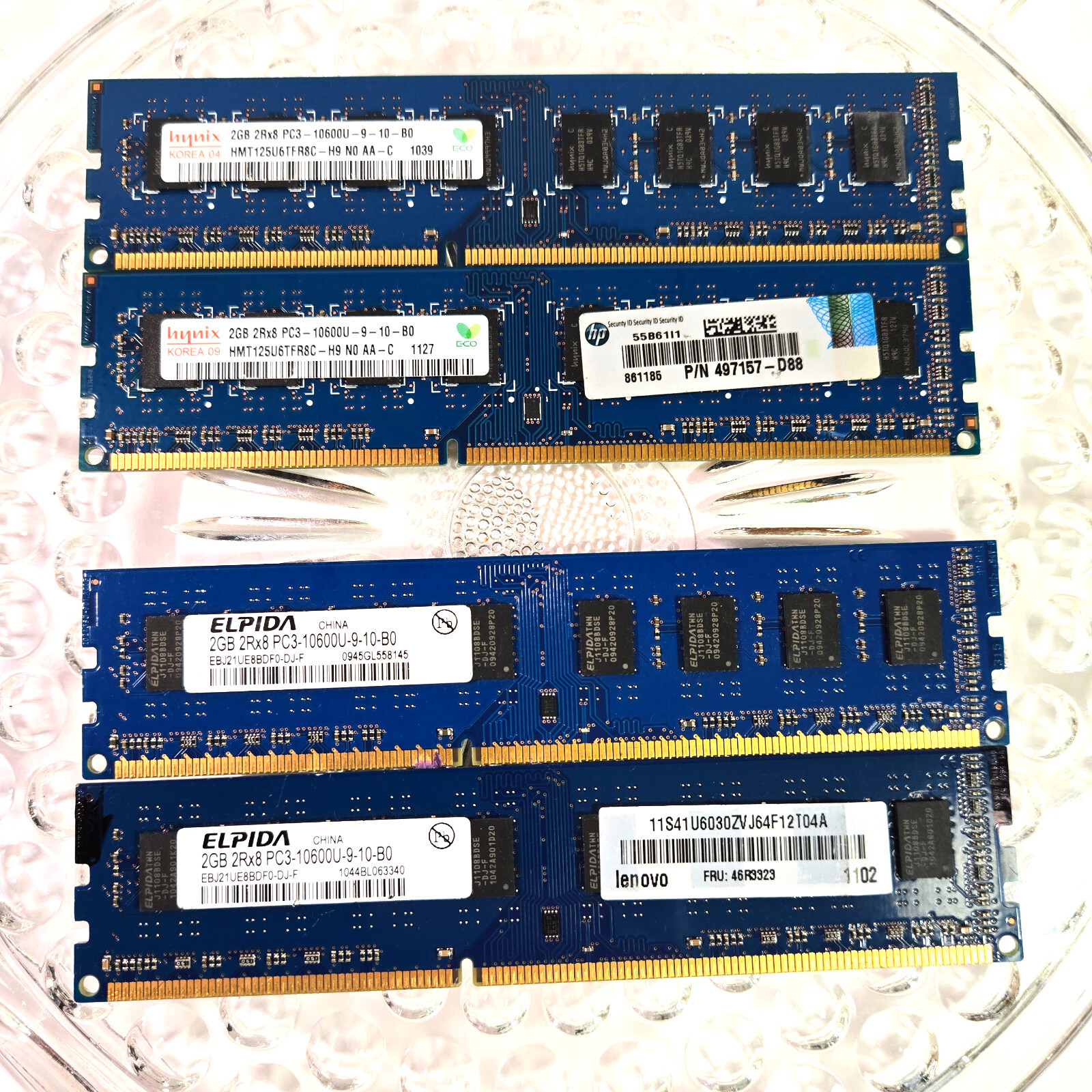 4 Sticks of 2 gig ram PC3 10600U-9-10-B0 mixed lot Modules. Total 8 Gigs of RAM