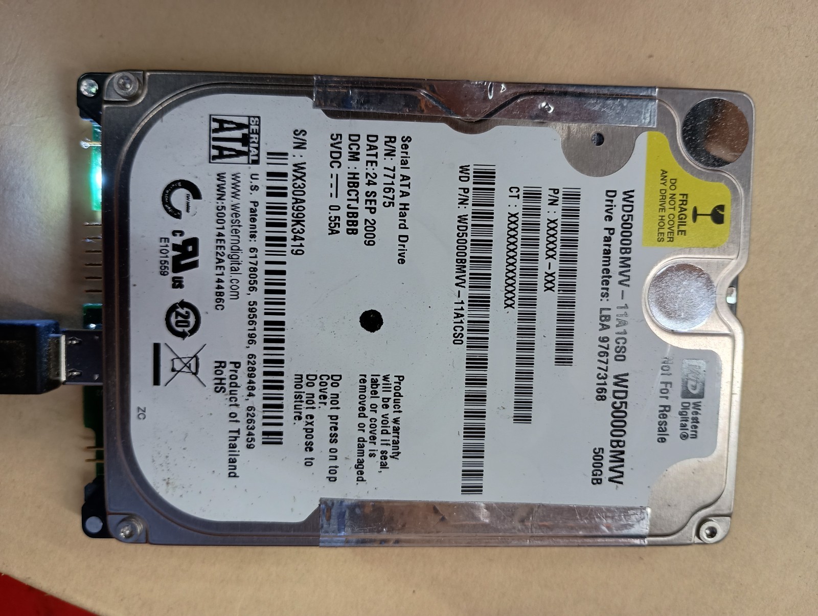WD5000BMVV-11A1CS0 S/N: WX30A99K3419 DCM: HBCTJBBB WD 500GB THAILAND SEP 2009