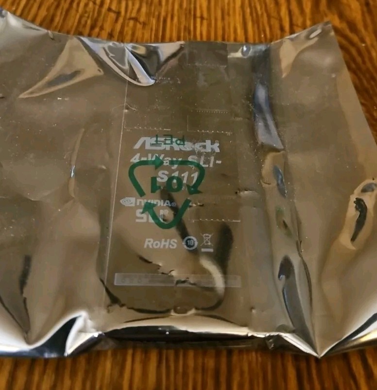 Sealed New Asrock 4-Way SLI-S111 Bridge nVidia 0C1R179-00112 80-CXG2R0-1C01
